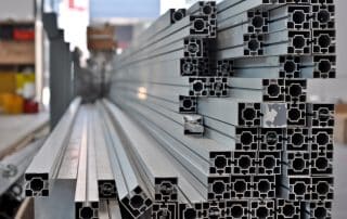 Gallagher Transport International showcases aluminum profiles used in manufacturing—highlighting impacts of the Steel and Aluminum Increase.