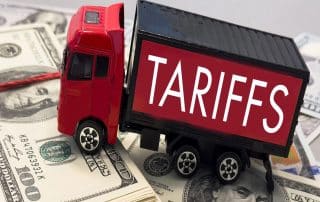 The image illustrates the concept of trade conflict, supporting the headline “White House Announces Sweeping New Reciprocal Tariffs With Immediate Effect” as part of Gallagher Transport International’s insights on customs and commercial trade.